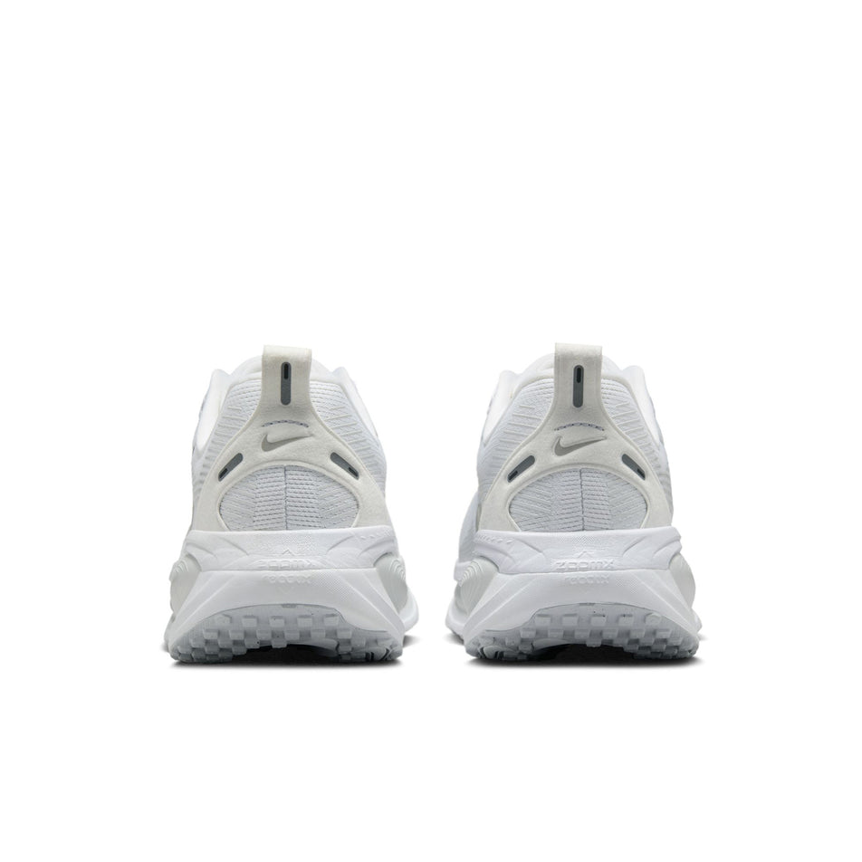 The back of a pair of Nike Women's Vomero 18 Road Running Shoes in the White/Metallic Silver-Photon Dust colourway. (8686789361826)