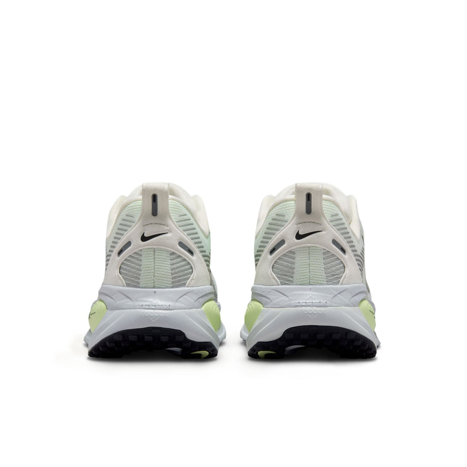 The back of a pair of Nike Women's Vomero 18 Road Running Shoes in the Summit White/Black-Barely Volt colourway. (8725386592418)