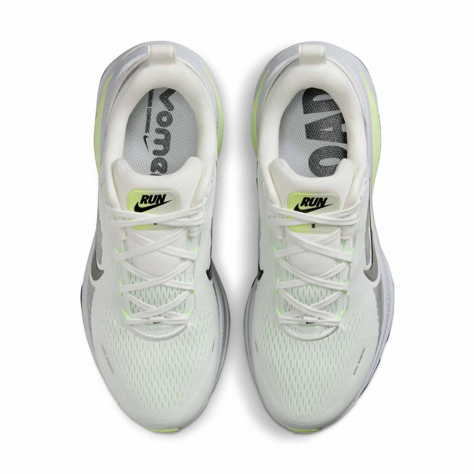 The uppers of a pair of Nike Women's Vomero 18 Road Running Shoes in the Summit White/Black-Barely Volt colourway. (8725386592418)