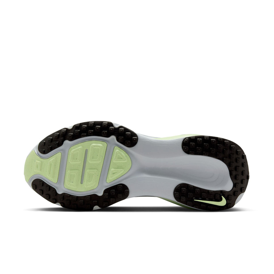 The outsole of the left shoe from a pair of Nike Women's Vomero 18 Road Running Shoes in the Summit White/Black-Barely Volt colourway. (8725386592418)