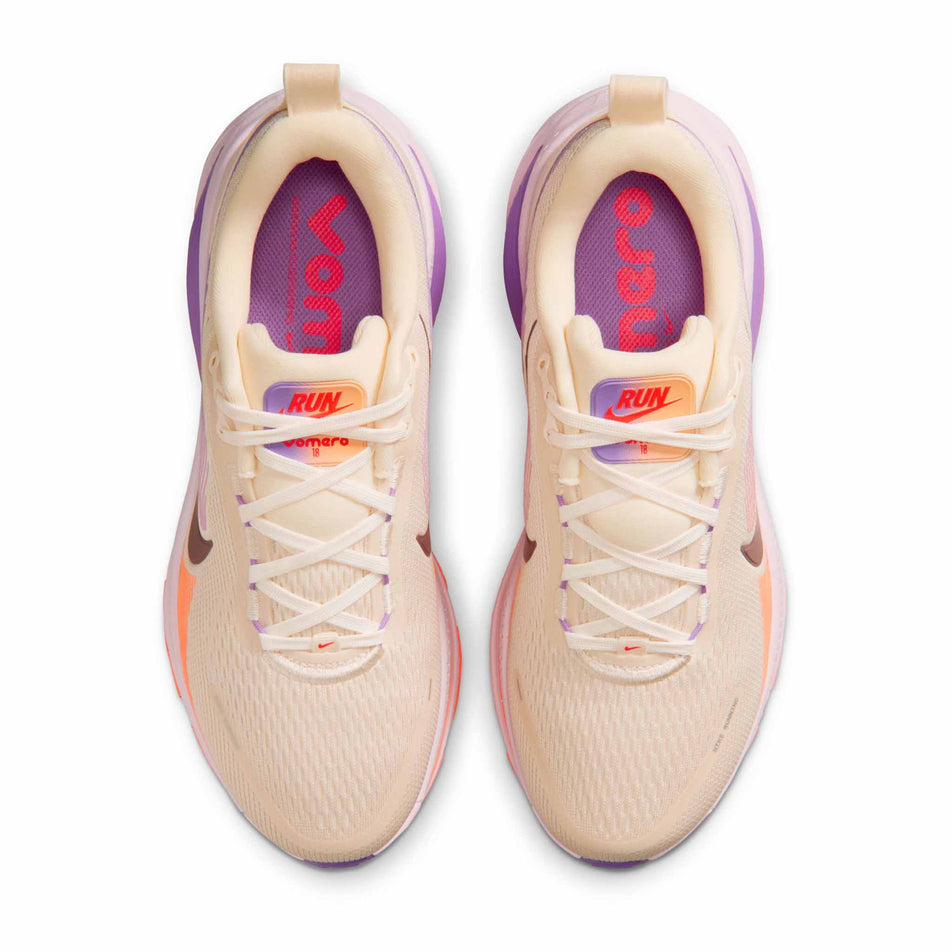 The uppers of a pair of Nike Women's Vomero 18 Road Running Shoes in the Chalk/Tattoo-Pink Foam-Bright Violet colourway.