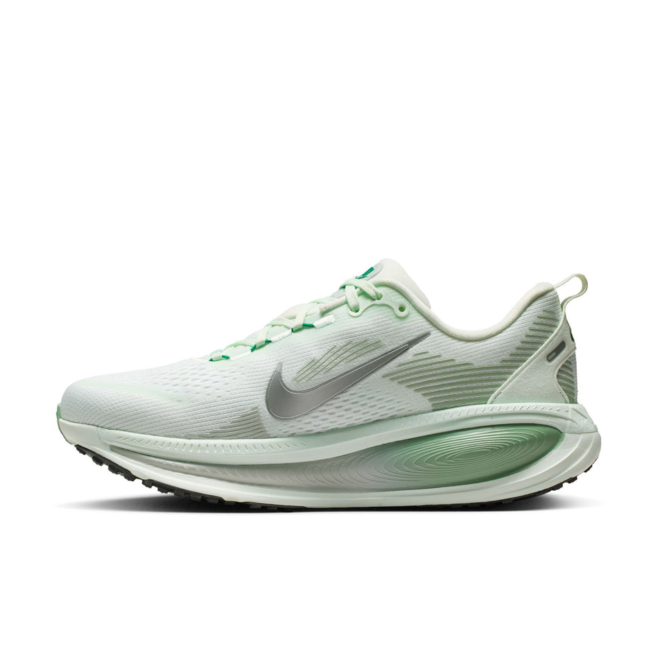 Medial view of the right shoe from a pair of Nike Women's Vomero 18 Road Running Shoes in the Barely Green/Metallic Silver-Steam colourway.