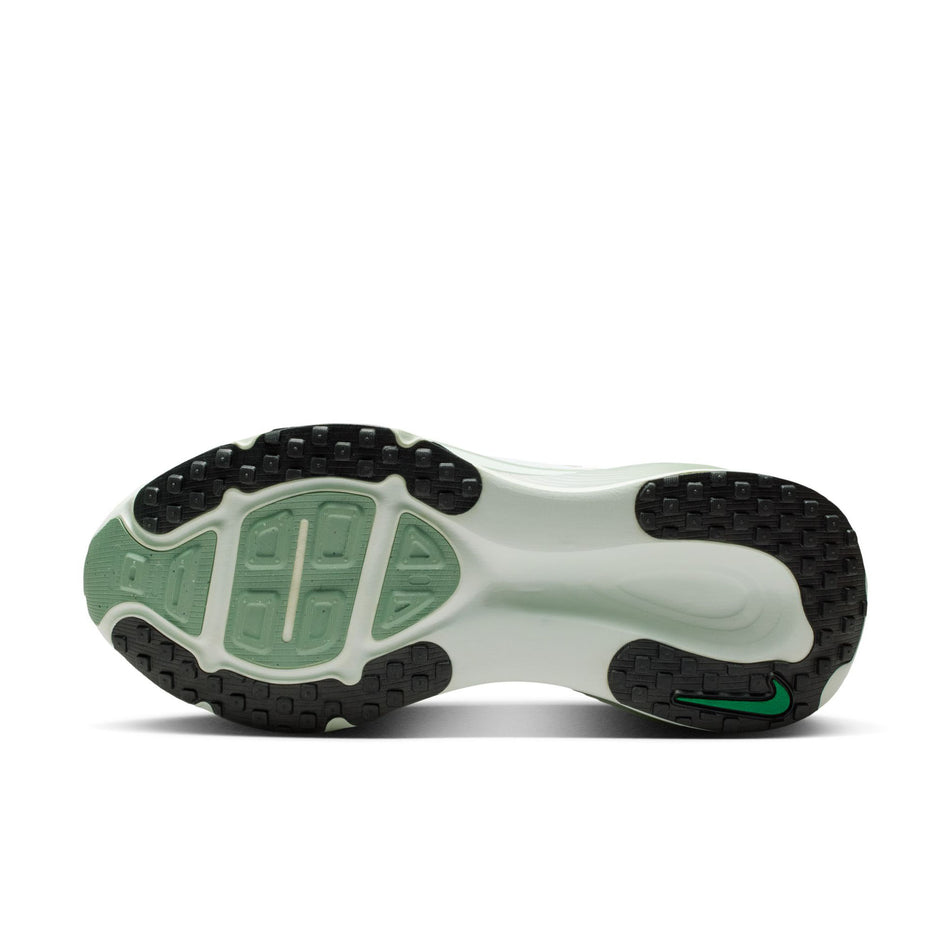 The outsole of the left shoe from a pair of Nike Women's Vomero 18 Road Running Shoes in the Barely Green/Metallic Silver-Steam colourway.