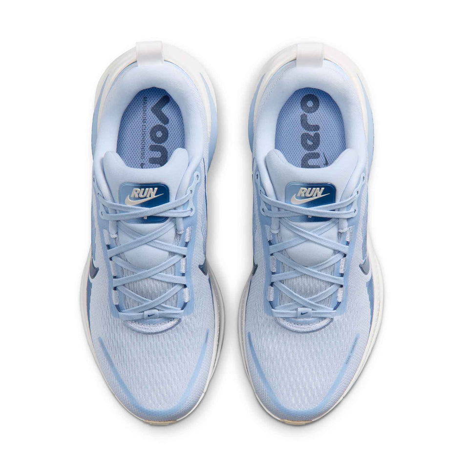 The uppers of a pair of Nike Women's Vomero 18 Road Running Shoes in the Hydrogen Blue/Mystic Navy-Aluminum colourway.
