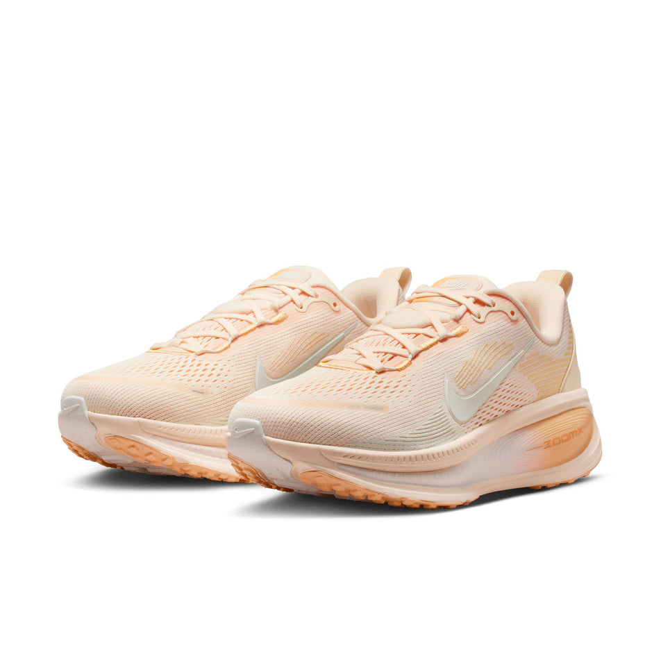 A pair of Nike Women's Vomero 18 Road Running Shoes in the Guava Ice/Sail-Orange Chalk colourway.