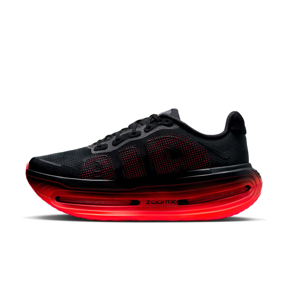 Medial view of the right shoe from a pair of Nike Men's Vomero Premium Road Running Shoes in the Black/Black-Bright Crimson colourway.