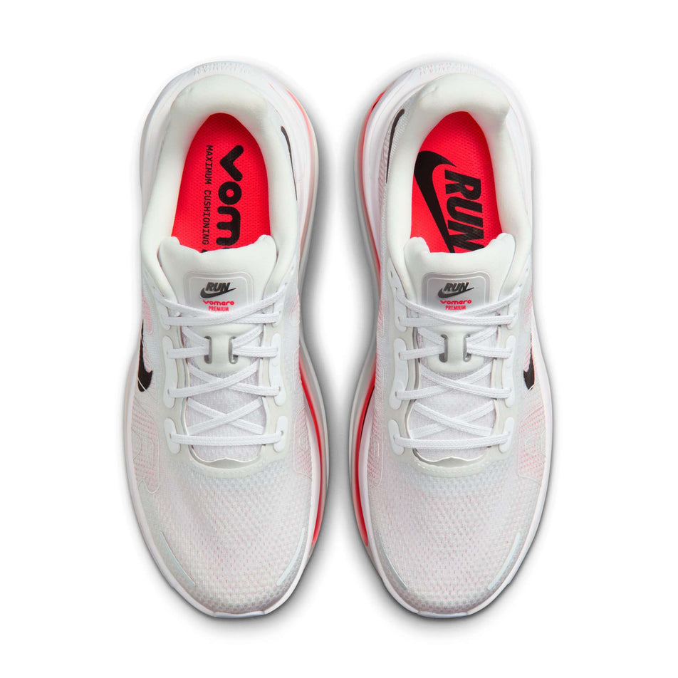 The uppers of a pair of Nike Men's Vomero Premium Road Running Shoes in the White/Black-Bright Crimson-Photon Dust colourway.