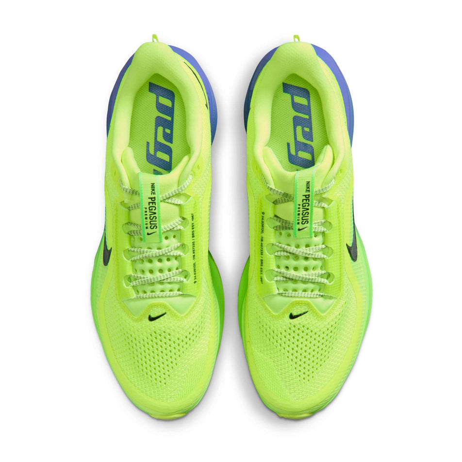 The uppers of a pair of Nike Men's Pegasus Premium Road Running Shoes in the Volt Ice/Black Spruce-Lime Blast colourway.