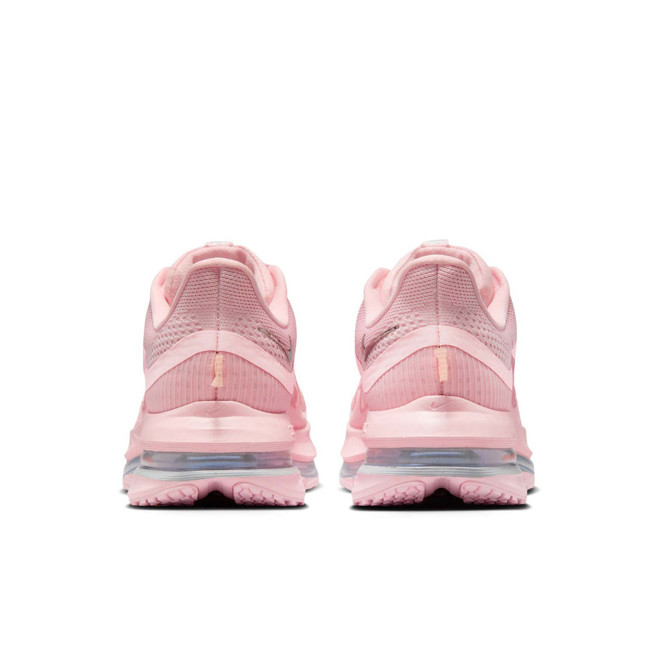 The back of a pair of Nike Women's Pegasus Premium Road Running Shoes in the Atmosphere/Red Stardust-Metallic Silver. (8615426523298)