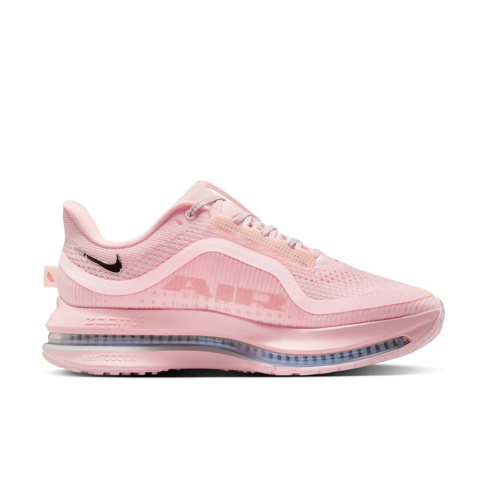 Medial view of the left shoe from a pair of Nike Women's Pegasus Premium Road Running Shoes in the Atmosphere/Red Stardust-Metallic Silver. (8615426523298)