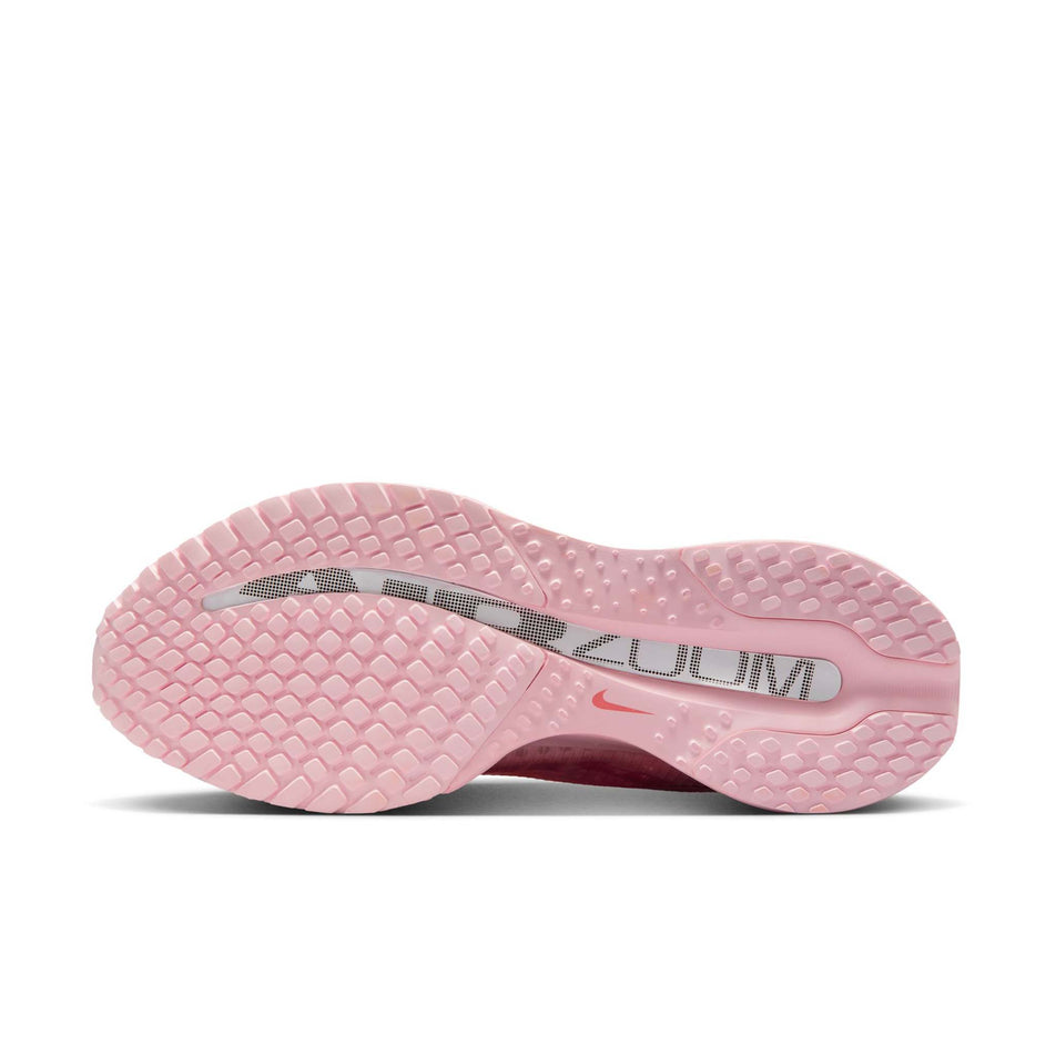 The outsole of the left shoe from a pair of Nike Women's Pegasus Premium Road Running Shoes in the Atmosphere/Red Stardust-Metallic Silver. (8615426523298)