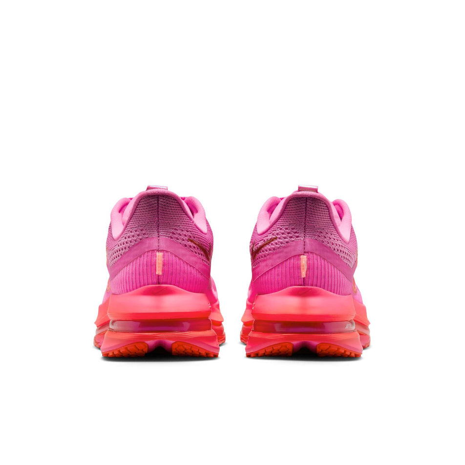 The back of a pair of Nike Women's Pegasus Premium Road Running Shoes in the Playful Pink/Bright Crimson-Hyper Pink colourway. (8684696371362)