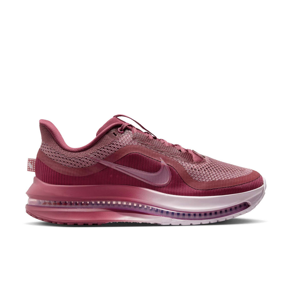 Lateral view of the right shoe from a pair of Nike Women's Pegasus Premium Road Running Shoes in the Pink Smoke/Pink Smoke-Light Magenta colourway.