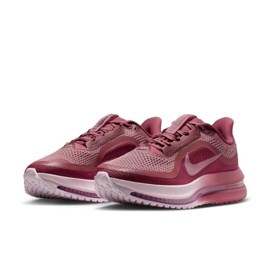 A pair of Nike Women's Pegasus Premium Road Running Shoes in the Pink Smoke/Pink Smoke-Light Magenta colourway.