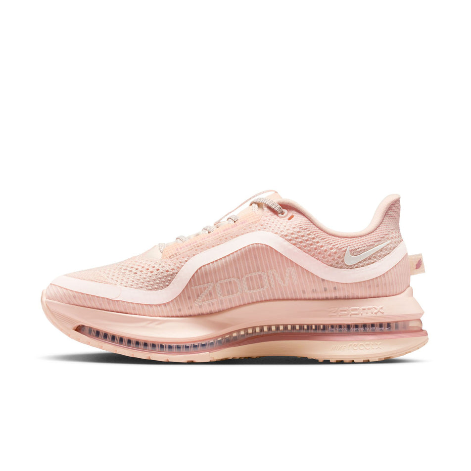 Medial view of the right shoe from a pair of Nike Women's Pegasus Premium Road Running Shoes in the Guava Ice/Sail-Particle Pink colourway.