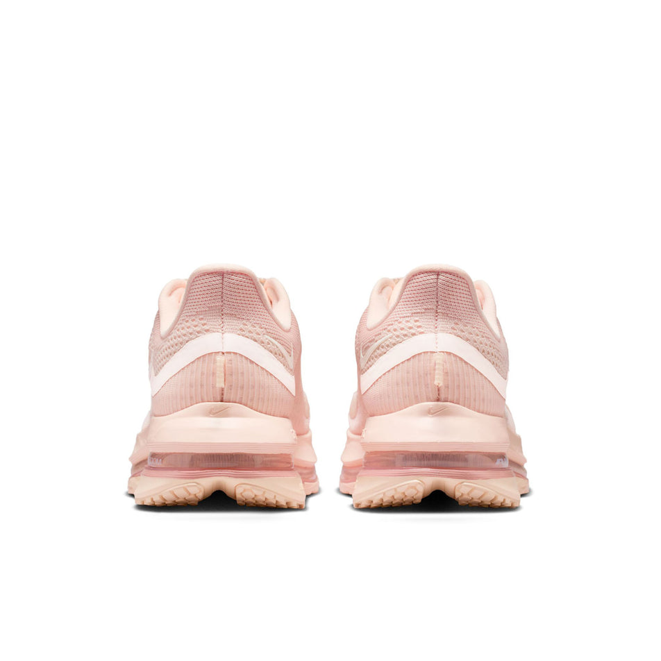 The back of a pair of Nike Women's Pegasus Premium Road Running Shoes in the Guava Ice/Sail-Particle Pink colourway.