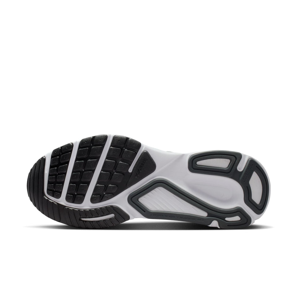 The outsole of the left shoe from a pair of Nike Men's Structure Plus Road Running Shoes in the Black/White-Anthracite colourway.