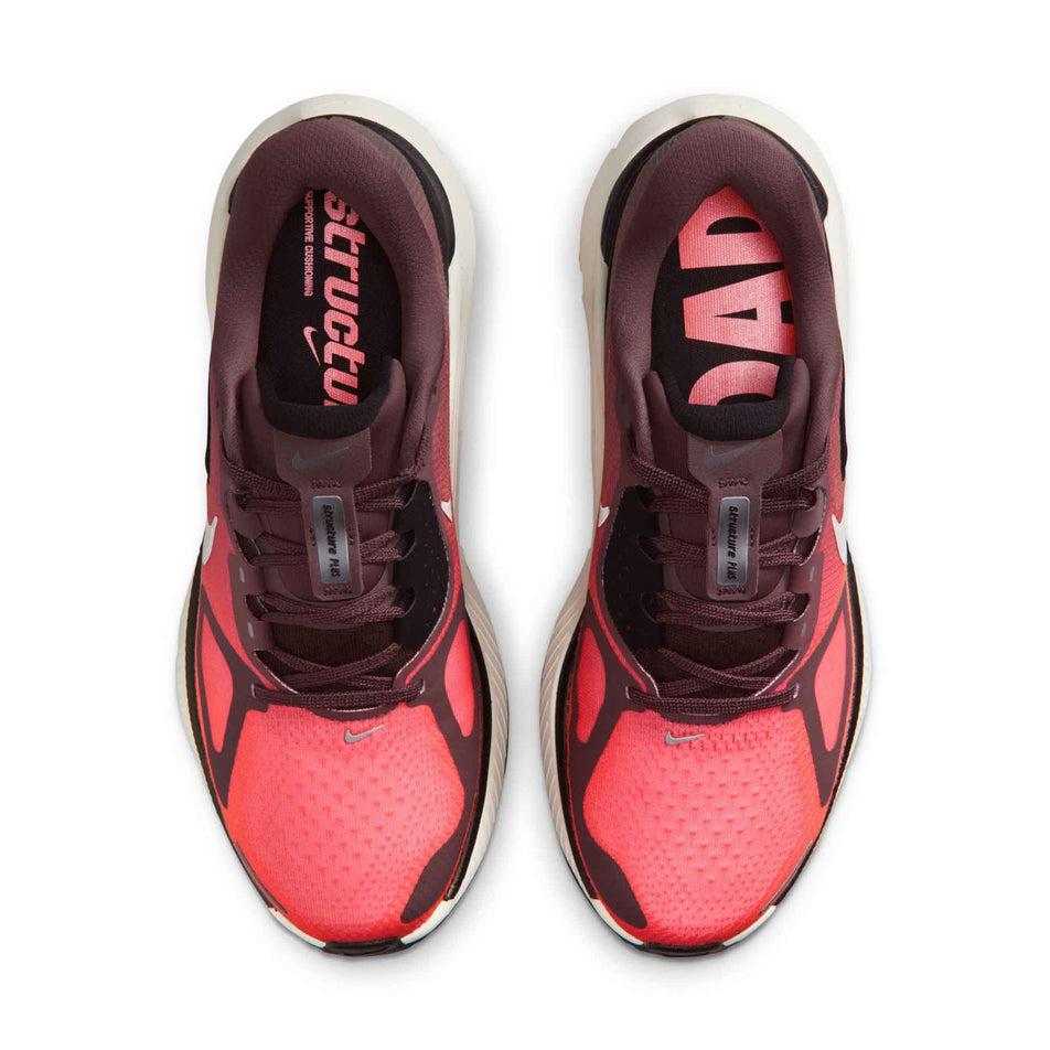 The uppers of a pair of Nike Women's Structure Plus Road Running Shoes in the Tattoo/Silver-Hot Lava-Black colourway.