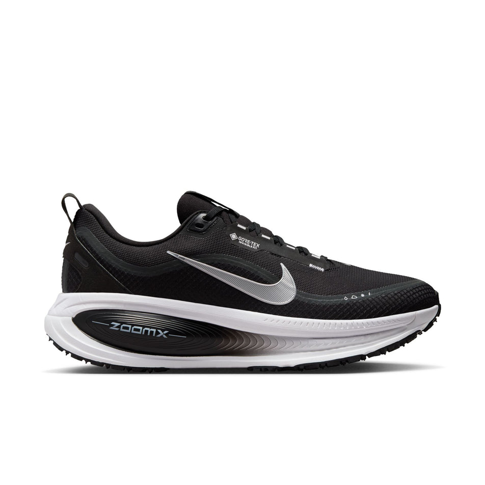 Lateral view of the right shoe from a pair of Nike Men's Vomero 18 GORE-TEX Road Running Shoes in the Black/Metallic Silver-Anthracite-White colourway. (8754898501794)