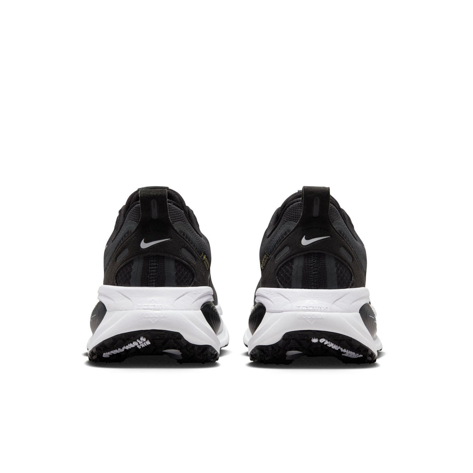 The back of a pair of Nike Men's Vomero 18 GORE-TEX Road Running Shoes in the Black/Metallic Silver-Anthracite-White colourway. (8754898501794)