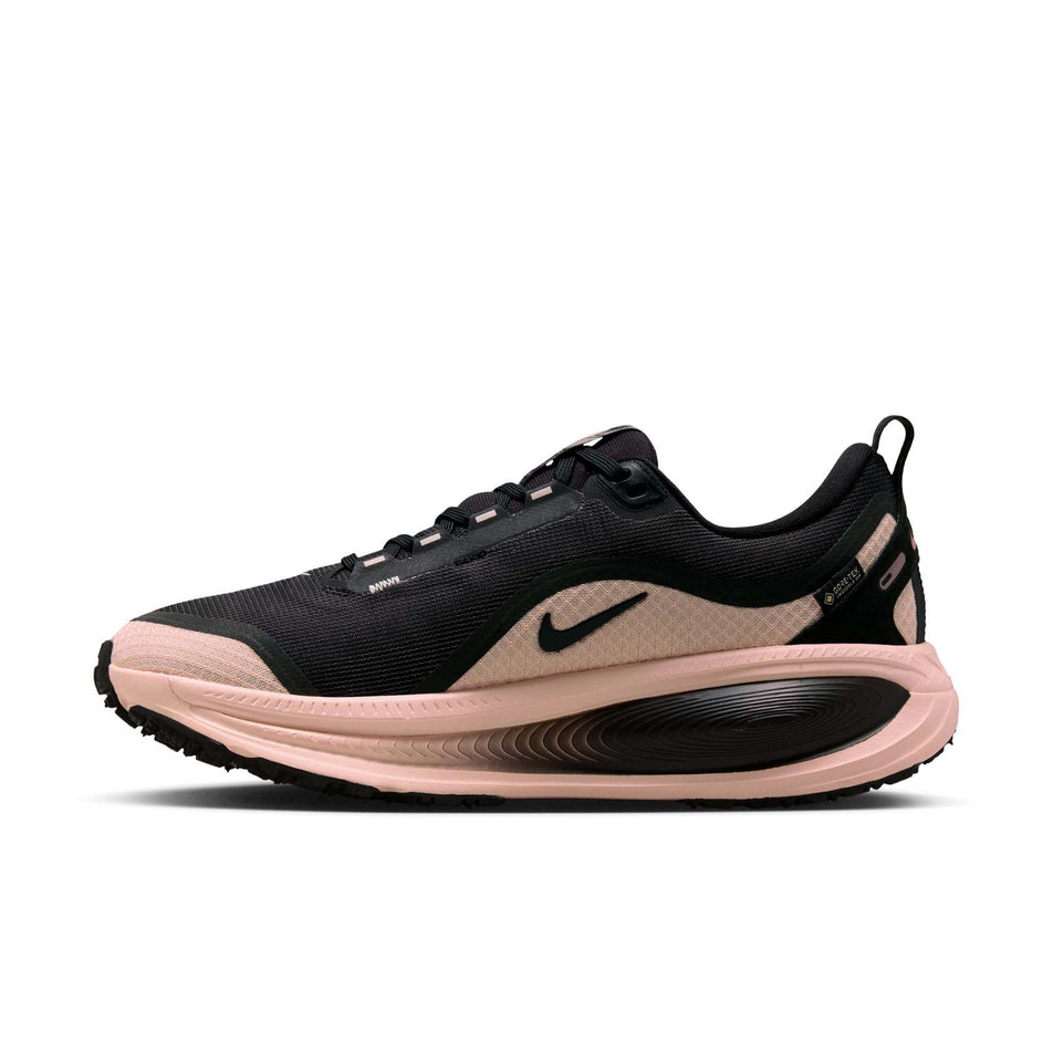 Medial view of the right shoe from a pair of Nike Women's Vomero 18 GORE-TEX Road Running Shoes in the Black/Black-Crimson Tint-Black colourway. (8756162494626)