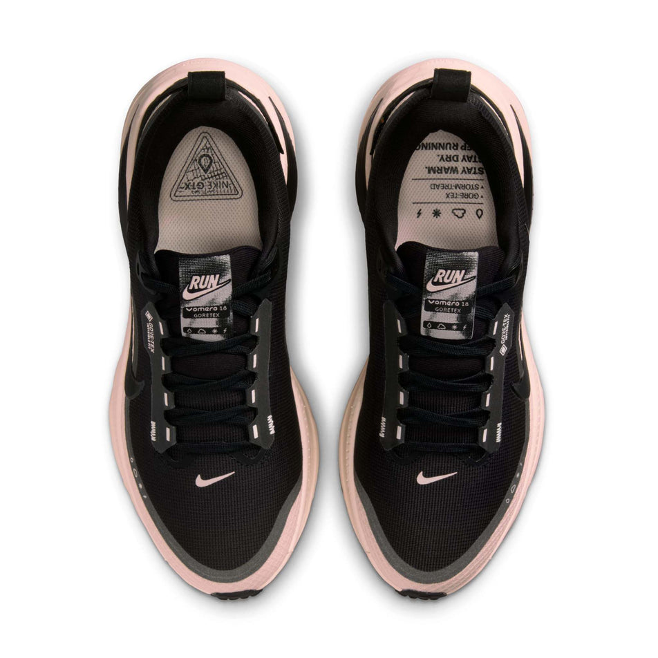 The uppers of a pair of Nike Women's Vomero 18 GORE-TEX Road Running Shoes in the Black/Black-Crimson Tint-Black colourway. (8756162494626)