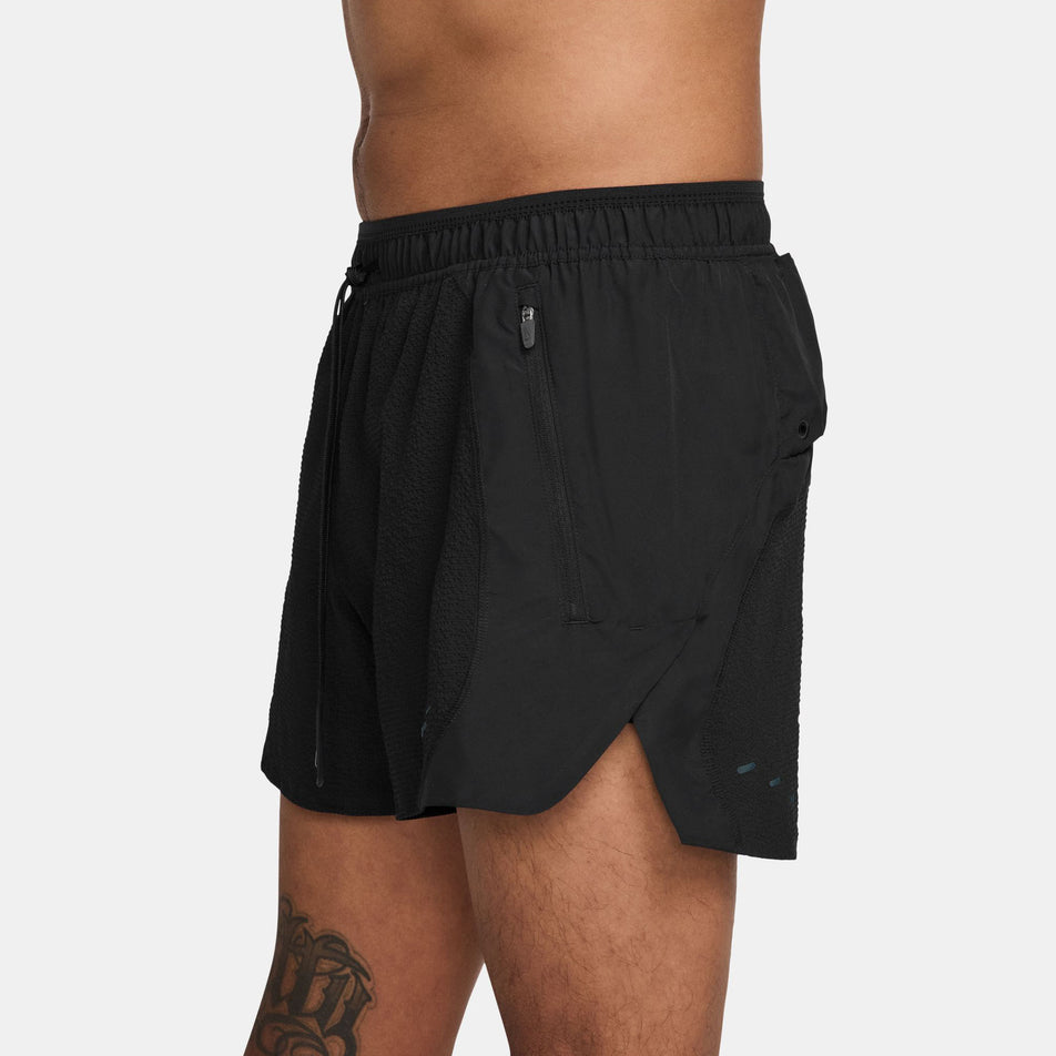 Side view a model wearing the Nike  Men's Dri-FIT ADV 5