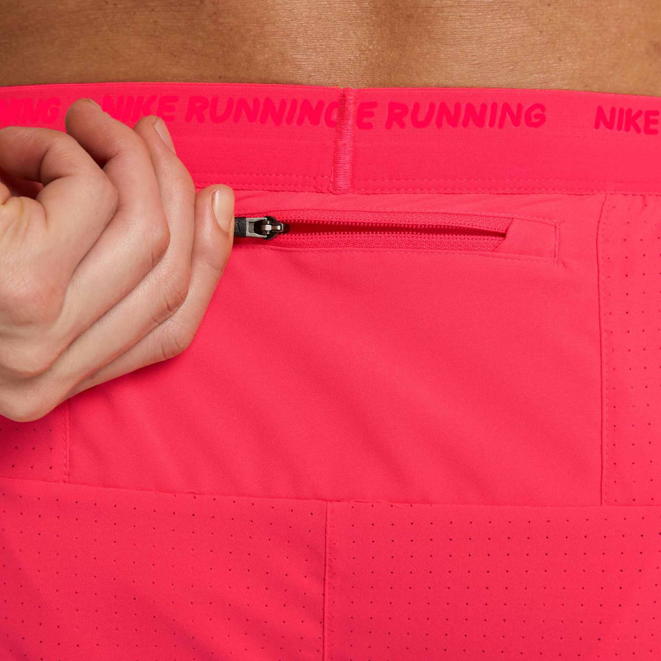 Close up of the zip pocket on the back of the Nike Men's Stride Dri-FIT 5