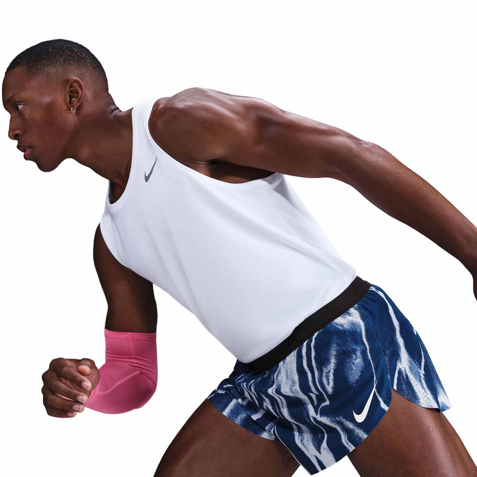 Angled view of a model wearing the Nike Men's AeroSwift Dri-FIT ADV 2