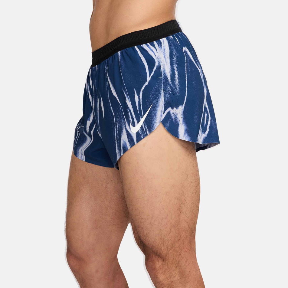 Side view of a model wearing the Nike Men's AeroSwift Dri-FIT ADV 2