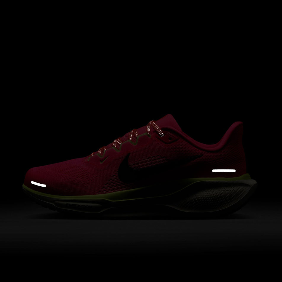 The reflective details on the lateral side of the left shoe from a pair of Nike Women's Pegasus 41 Road Running Shoes in the Hyper Pink/Sequoia-Guava Ice colourway. (8620734120098)