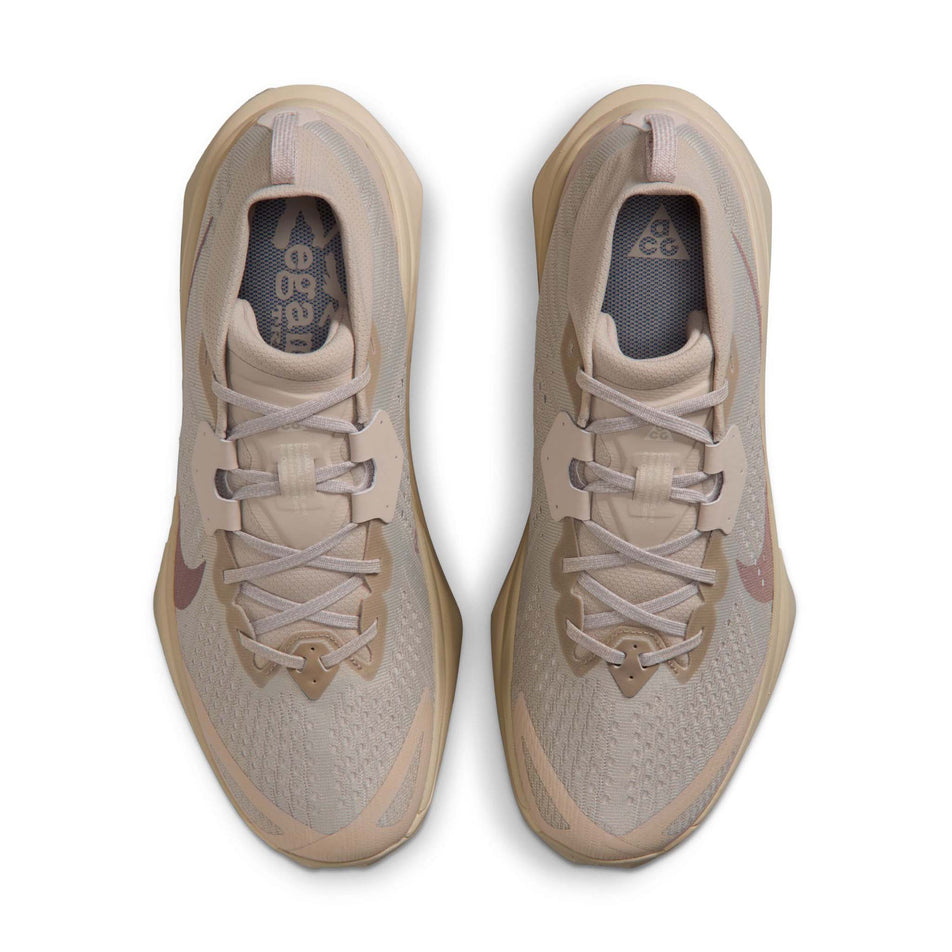 The uppers of a pair of Nike Men's ACG Zegama Trail Running Shoes in the Cream II/Diffused Taupe-Light Orewood Brown colourway.