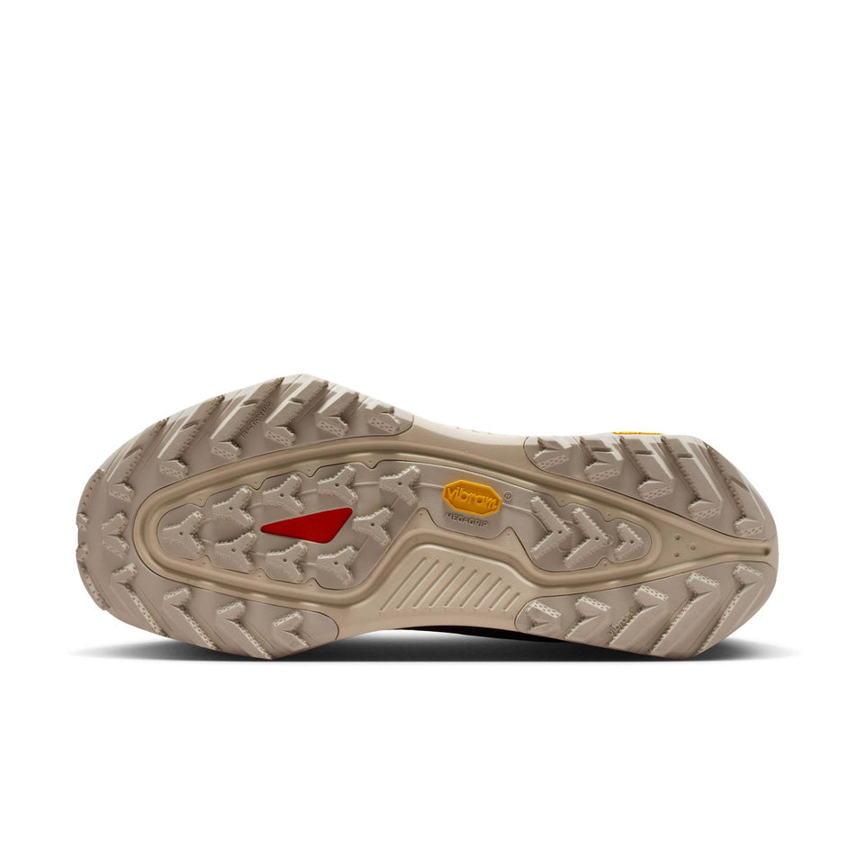 The outsole of the left shoe from a pair of Nike Men's ACG Zegama Trail Running Shoes in the Cream II/Diffused Taupe-Light Orewood Brown colourway.