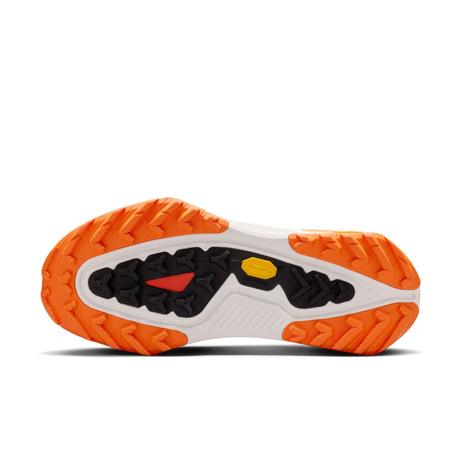 The outsole of the left shoe from a pair of Nike Women's ACG Zegama Trail Running Shoes -in the Summit White/Black-Phantom-Safety Orange colourway.