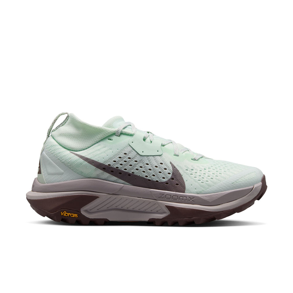 Lateral view of the right shoe from a pair of Nike Women's ACG Zegama Trail Running Shoes in the Barely Green/Silver Lilac-Tattoo colourway.