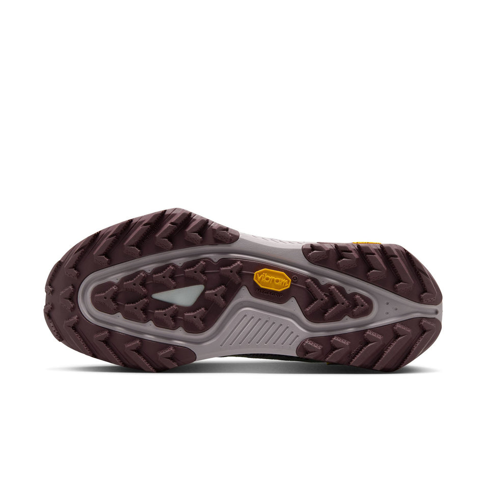 The outsole of the left shoe from a pair of Nike Women's ACG Zegama Trail Running Shoes in the Barely Green/Silver Lilac-Tattoo colourway.