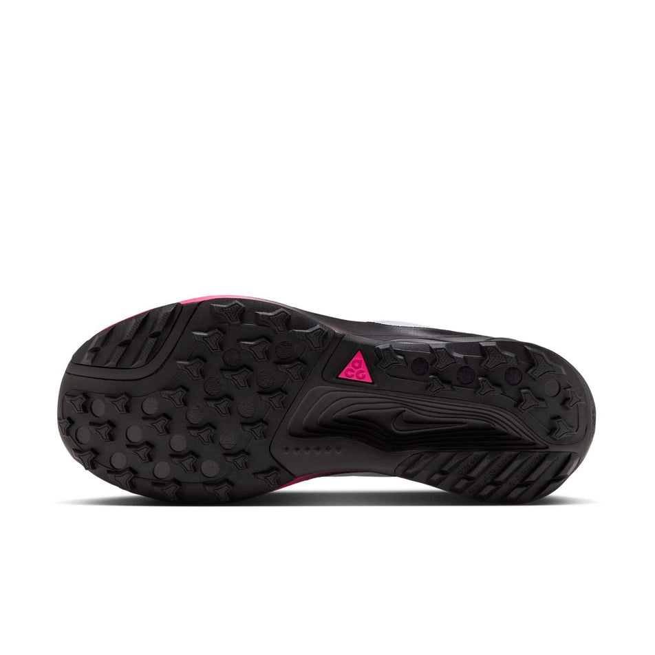 The outsole of the right shoe from a pair of Nike Men's ACG Pegasus Trail Running Shoes in the Pure Platinum/Black-Hyper Pink colourway.