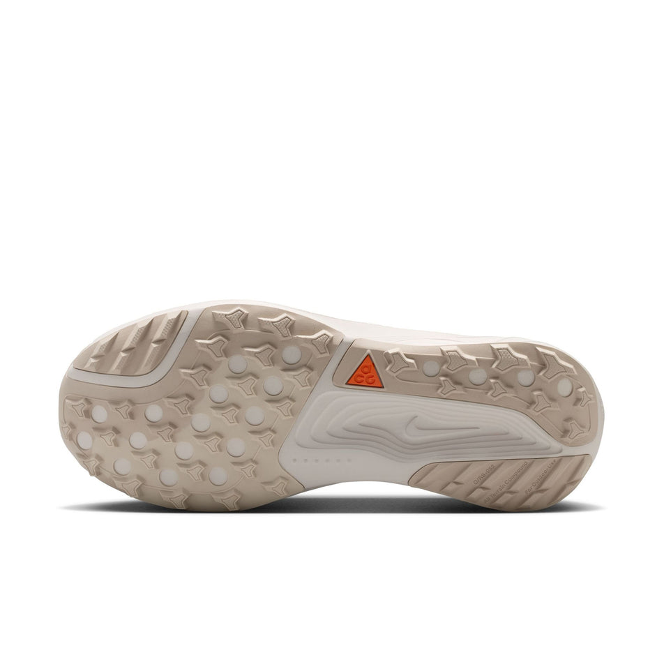 The outsole of the left shoe from a pair of Nike Men's ACG Pegasus Trail Running Shoes in the Cream II/Cream II-Light Orewood Brown colourway.