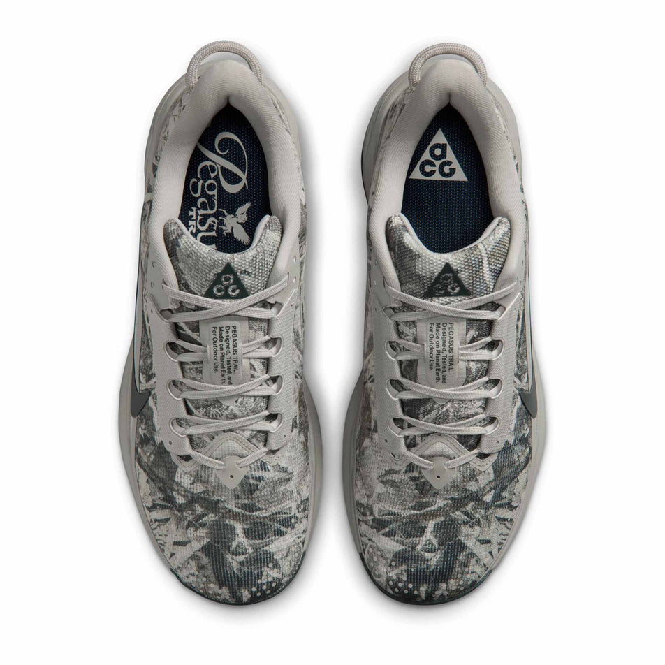 The uppers of pair of Nike Men's ACG Pegasus Trail Running Shoes in the Spruce Fog/Black Spruce-Sea Glass colourway.