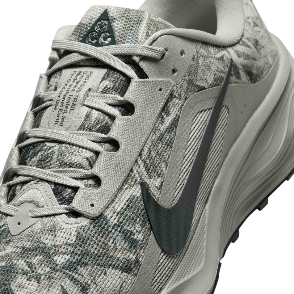 Close-up view of the upper of the left shoe from a pair of Nike Men's ACG Pegasus Trail Running Shoes in the Spruce Fog/Black Spruce-Sea Glass colourway.