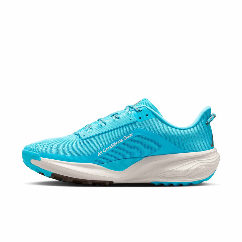 Medial view of the right shoe from a pair of Nike Men's ACG Pegasus Trail Running Shoes in the Baltic Blue/Summit White-Light Orewood Brown colourway.