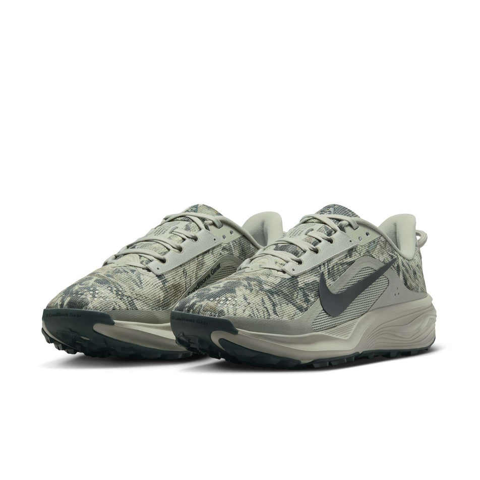 A pair of Nike Women's ACG Pegasus Trail Running Shoes in the Spruce Fog/Black Spruce-Sea Glass colourway.