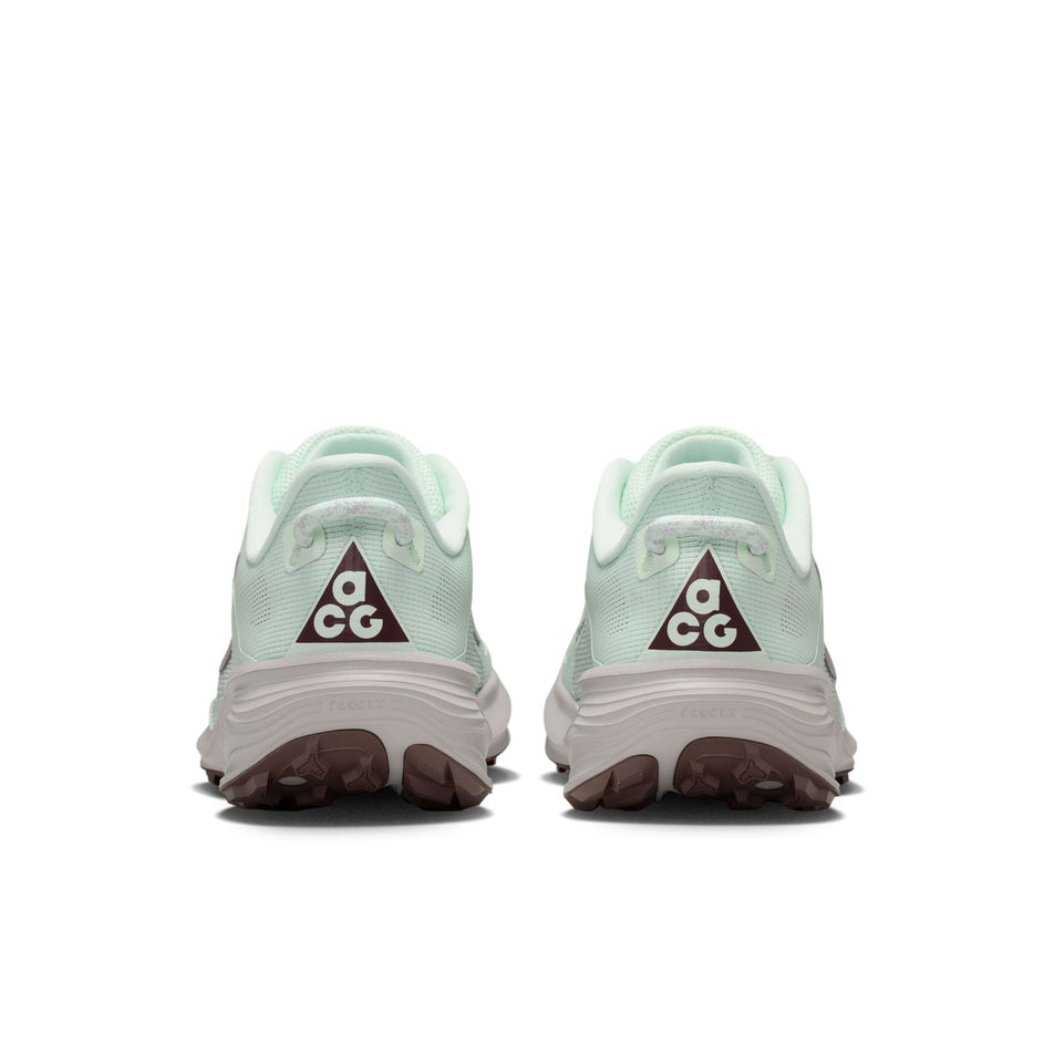 The back of a pair of Nike Women's ACG Pegasus Trail Running Shoes in the Barely Green/Silver Lilac-Light Bone colourway.