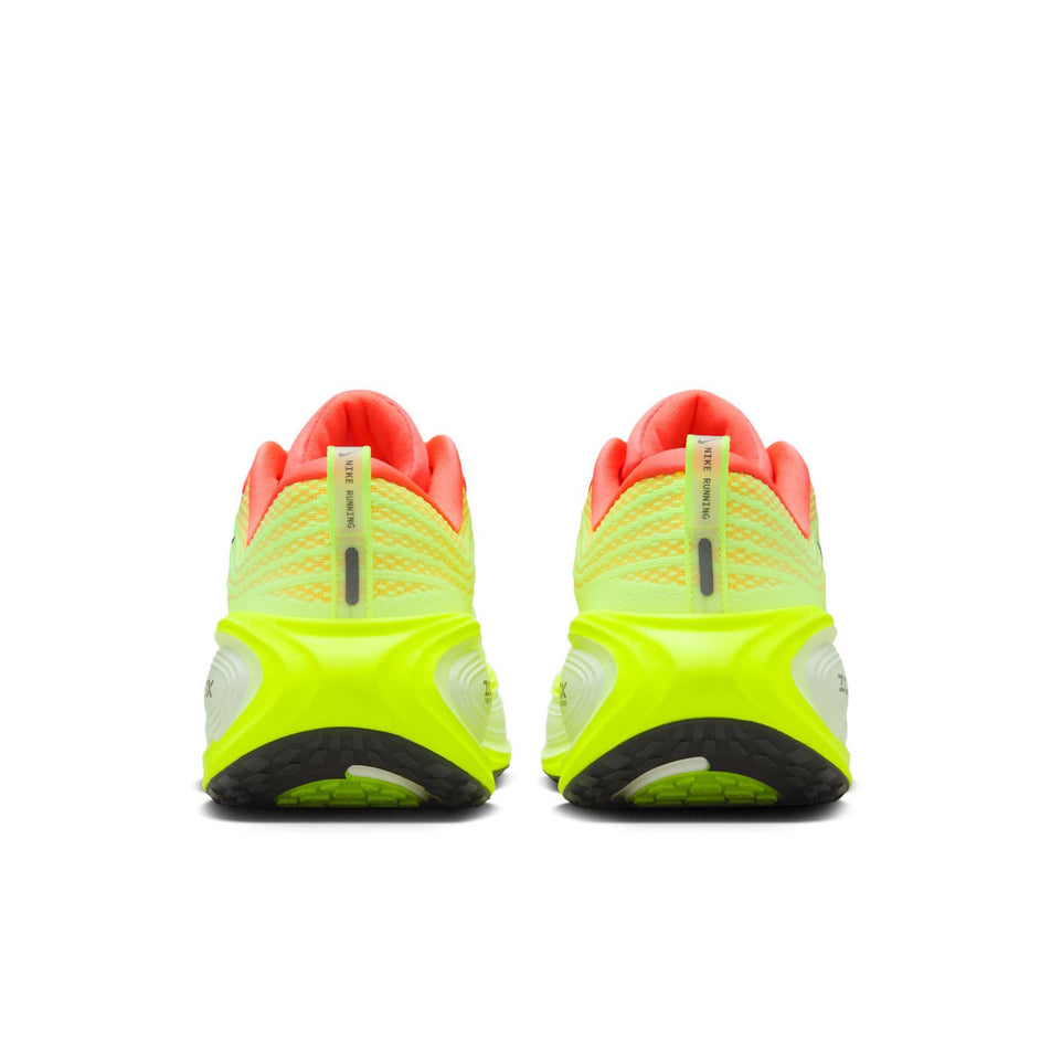 The back of a pair of Nike Men's Vomero Plus Road Running Shoes in the Bright Mango/Metallic Dark Grey Volt colourway. (8723707166882)