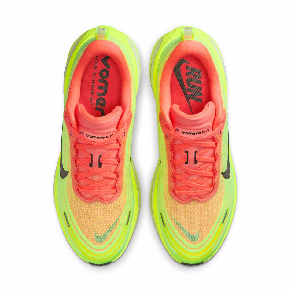 The uppers of a pair of Nike Men's Vomero Plus Road Running Shoes in the Bright Mango/Metallic Dark Grey Volt colourway. (8723707166882)