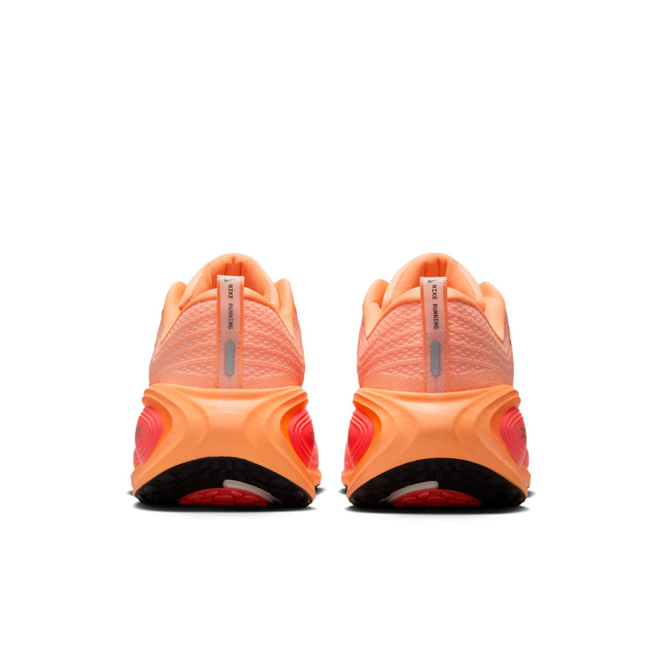 The back of a pair of Nike Men's Vomero Plus Road Running Shoes in the Orange Pulse/Black-Hot Lava-Total Orange-Orange Chalk-Metallic Dark Grey colourway. (8725442330786)