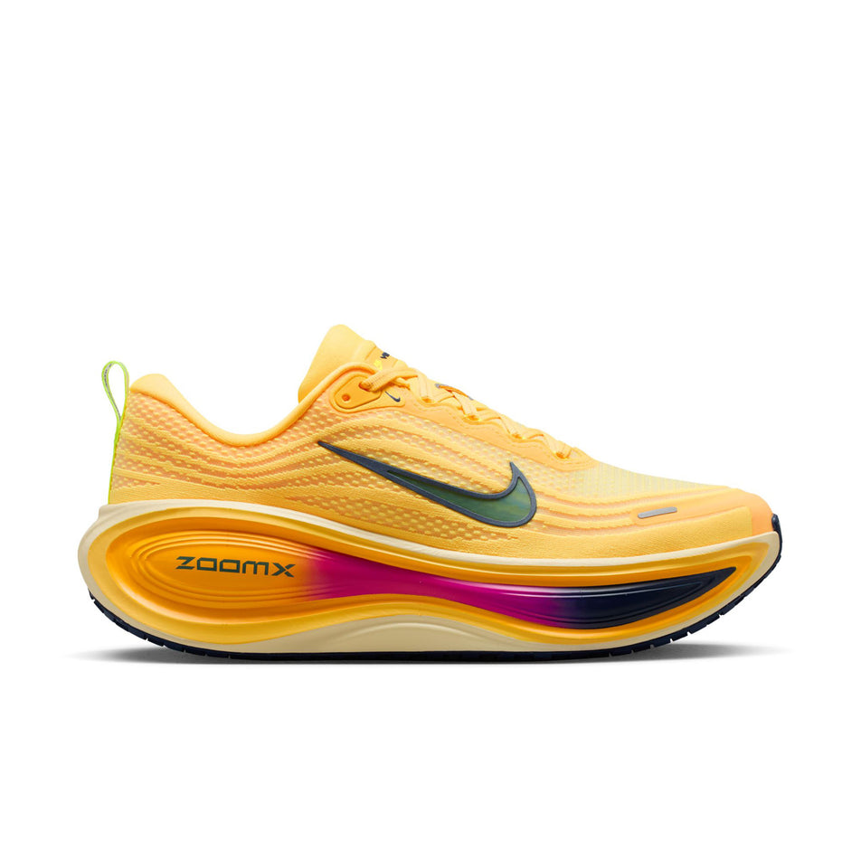 Lateral view of the right shoe from a pair of Nike Men's Vomero Plus Road Running Shoes in the Citron Pulse/Blue Void-Alabaster colourway.