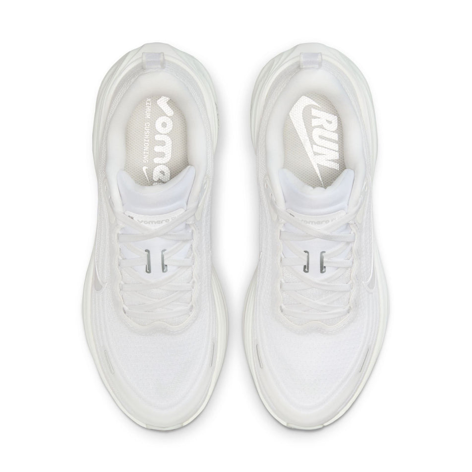 The uppers of a pair of Nike Women's Vomero Plus Road Running Shoes in the White/Summit White-Photon Dust colourway. (8756158660770)