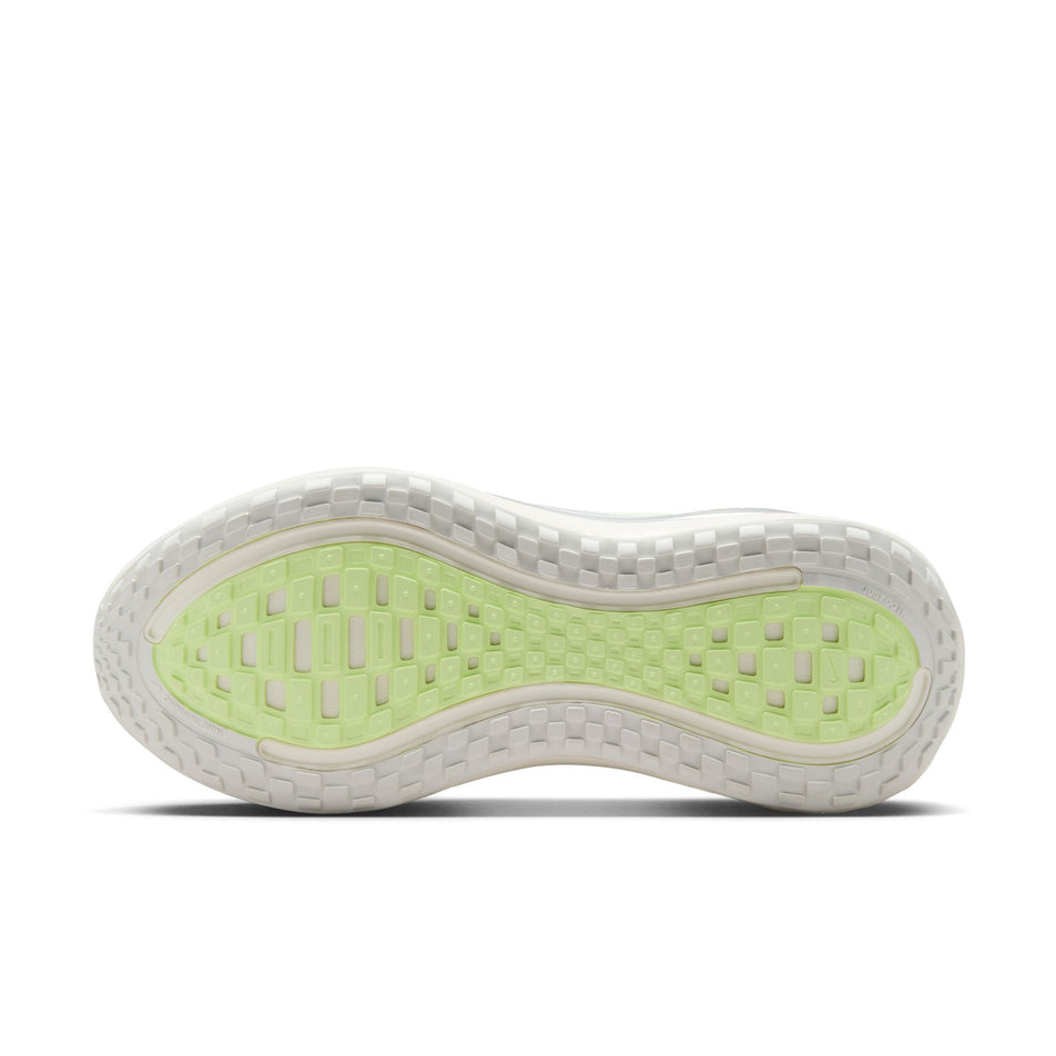 The outsole of the left shoe from a pair of Nike Women's Vomero Plus Road Running Shoes in the Sail/Metallic Silver-Barely Volt colourway. (8725325480098)