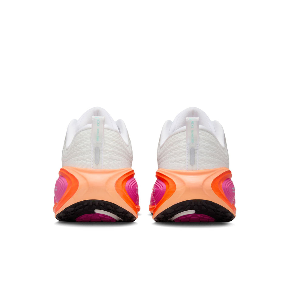 The back of a pair of Nike Women's Vomero Plus Road Running Shoes in the White/Black-Fire Pink-Hyper Crimson colourway. (8756160888994)